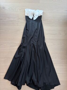 Black Strapless Evening Gown with Cream Bow Accent Prom